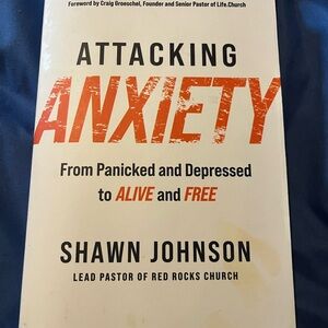 Attacking Anxiety Book by Shawn Johnson - White and Orange Cover